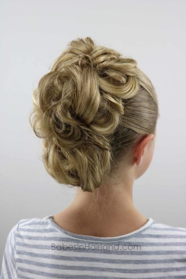 This easy and fabulous faux hawk will have you turning heads and getting compliments on your hairstyle non-stop. Try it today from BabesInHairland.com #hair #hairstyle #fauxhawk #updo #fohawk #beauty #cutehairstyle