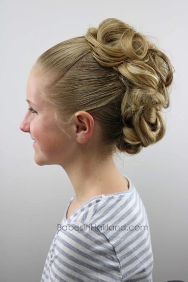 This easy and fabulous faux hawk will have you turning heads and getting compliments on your hairstyle non-stop. Try it today from BabesInHairland.com #hair #hairstyle #fauxhawk #updo #fohawk #beauty #cutehairstyle