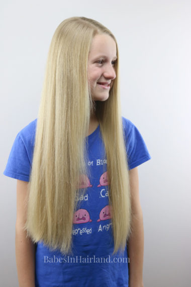 Thinking of cutting and donating your hair? Learn what this 11 year old did or just come learn more about growing your hair to cut and donate it from BabesInHairland.com #haircut #hair #longhair #hairdonation #locksoflove #hair cut #cute #hairstyles