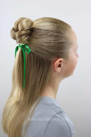 This is the cutest 4 leaf clover hairstyle for St. Patrick's Day I've seen in a long time!  BabesInHairland.com has a fast and easy tutorial for this lucky hairstyle! #hair #hairstyle #shamrock #stpatricksday #lucky #4leafclover #4leafcloverhairstyle