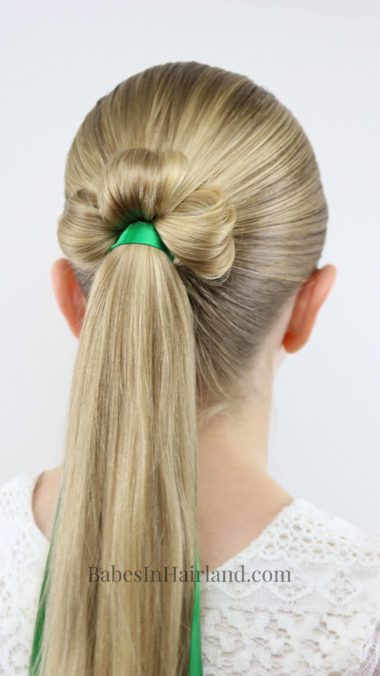 This is the cutest St. Patrick's Day hairstyle I've seen! Try a Shamrock Ponytail for luck from BabesInHairland.com has a fast and easy tutorial for this lucky hairstyle! #hair #hairstyle #shamrock #stpatricksday #lucky #3leafclover #3leafcloverhairstyle