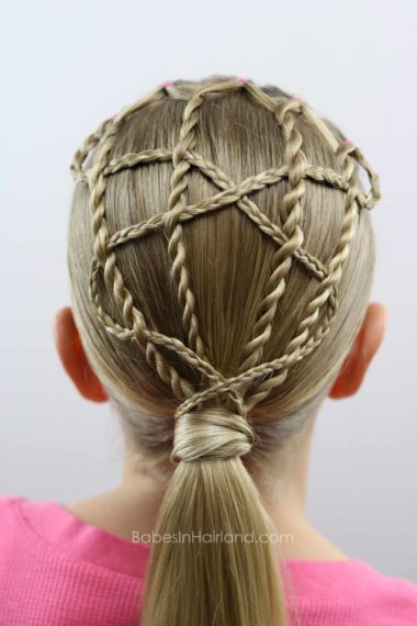 Create a cute & intricate hairstyle with just a few braids and rope twists. Twists & Winding Braids Style from BabesInHairland.com