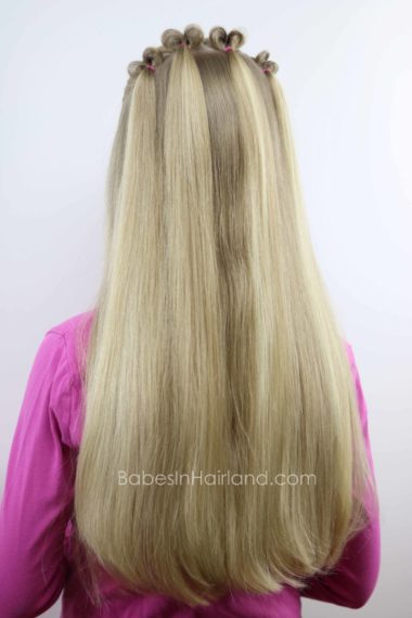 Looking for a Valentine's Day hairstyle? Look no further than this cute Topsy Tail Heart hairstyle from BabesInHairland.com | hair | holiday hair | easy hairstyle