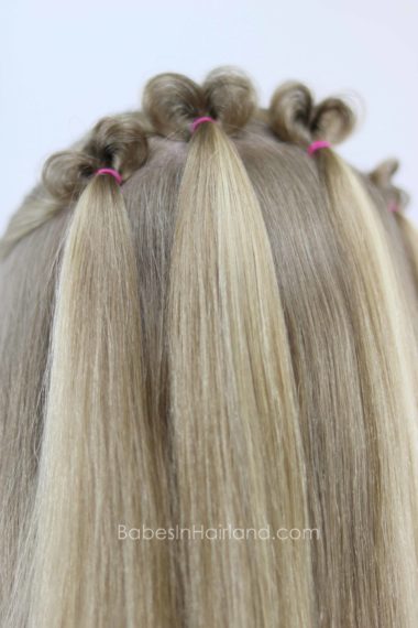 Looking for a Valentine's Day hairstyle? Look no further than this cute Topsy Tail Heart hairstyle from BabesInHairland.com | hair | holiday hair | easy hairstyle