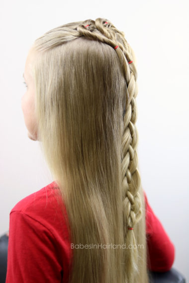Three hearts are better than one! We love this twisted heart and 4 strand braid hairstyle from BabesInHairland.com. It's perfect for school Valentine's Day parties. hair | braids | love
