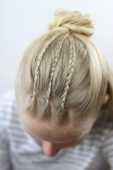 Try this half-up with accent braids style with 3 different looks. Combine micro braids, a fishtail braid and a flower bun and you can create 3 beautiful hairstyles. BabesInHairland.com