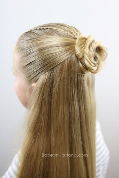 Try this half-up with accent braids style with 3 different looks. Combine micro braids, a fishtail braid and a flower bun and you can create 3 beautiful hairstyles. BabesInHairland.com