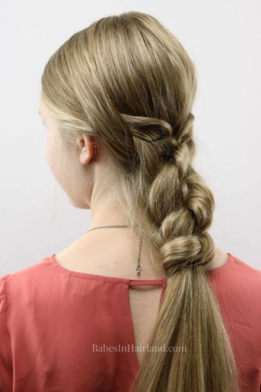 If you need a beautiful hairstyle that is easy and fast, this woven knot braid tutorial will have you out the door in 5 minutes. BabesInHairland.com
