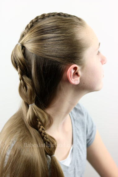 Combine a cool Dutch braid and bubble ponytail to create this edgy Peek-a-Boo French Braid hairstyle. BabesInHairland.com 
