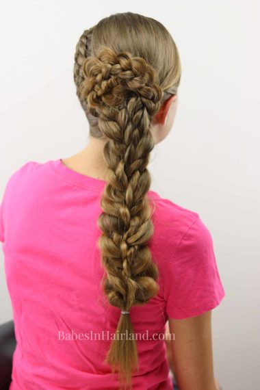 Get an edgy as well as elegant look with this Side Swept Braids and Braided Flower hairstyle from BabesInHairland.com | hair | braids | French braid | braid
