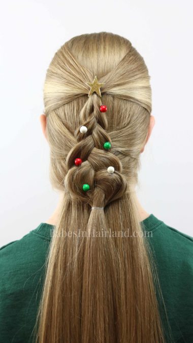 Everyone girl needs a cute hairstyle for Christmas. Try this pretty Mermaid Braid Christmas Tree from BabesInHairland.com. It's perfect for your Christmas plans and school. #hair #hairstyle #Christmashair #Christmastree #Christmashairstyle #mermaidbraid #braid #beauty #frenchbraid #dutchbraid